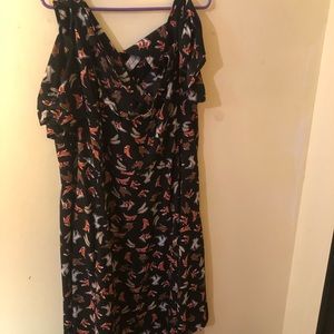 Black dress with shoe pattern.